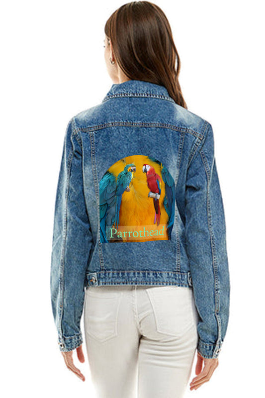 Lady wearing denim jacket with parrothead design on back.
